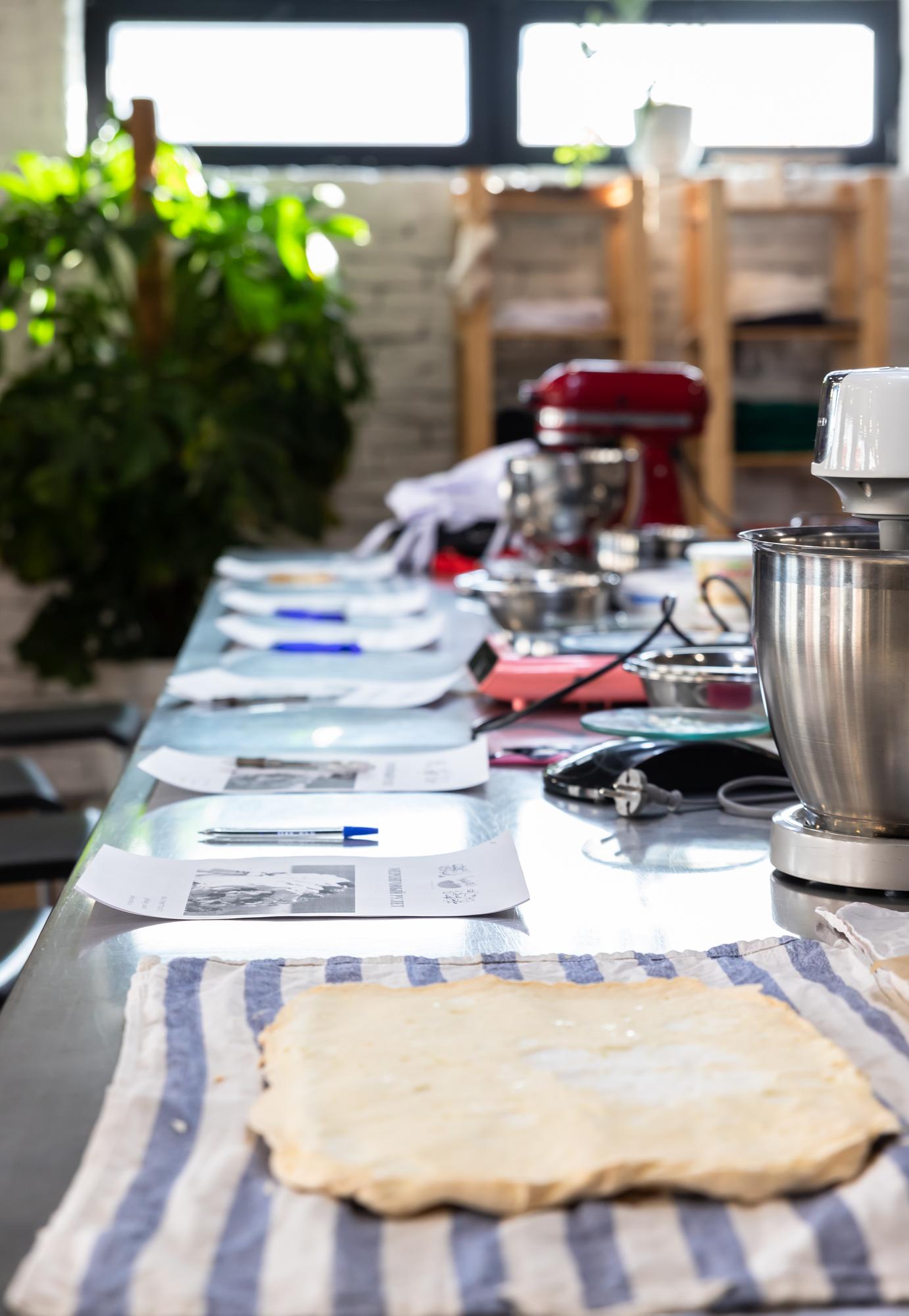 Table with tools and prep stations for workshop